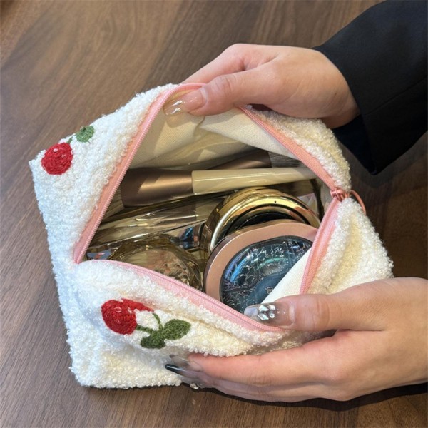 Fuzzy Embroidered Cherries Pouch 
- Full Zip Closure 
- Lined Body 
- Approximately 7" L X 4.5" T X 4" D