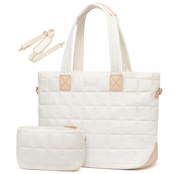 Nylon Quilted Tote Bag With Vegan Leather Accents 

- Full Zip Closure
- 1 External Zip Pocket 
- Laptop Pocket With Velcro Clasp
- 2 Open & 1 Zip Internal Pockets
- Quilted Wristlet Included
- Crossbody Strap Included
- Handle Drop 10" L
- Approximately 12" T X 19" L X 7" D