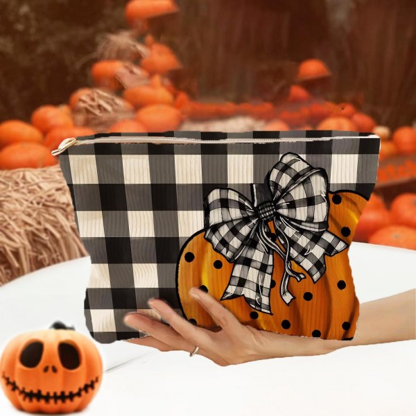 Plaid Pumpkin Bow Pouch 

- Full Zip Closure 
- Lined Body 
- Approximately 10" L X 7.75" T