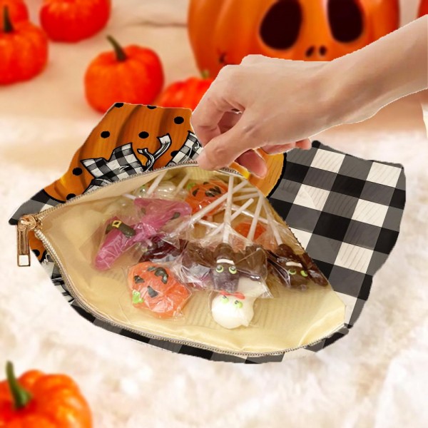 Plaid Pumpkin Bow Pouch 

- Full Zip Closure 
- Lined Body 
- Approximately 10" L X 7.75" T