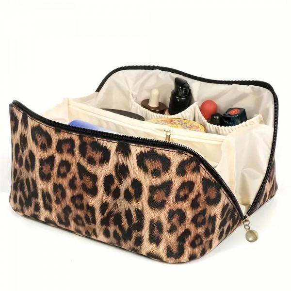 Vegan Leather Animal Print Travel Makeup Bag

- Full Zipper Closure
- 3 Internal Side Pockets & 1 Center Zipper Brush Pocket
- Center Lays Flat When Bag Is Opened
- Approximately 9” L X 5” T X 4” D