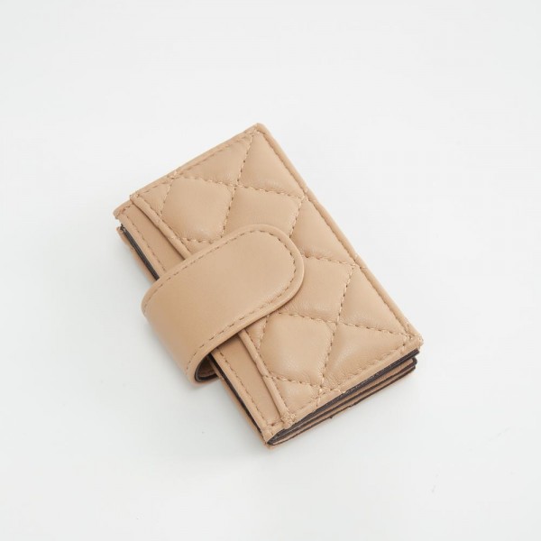 Quilted Vegan Leather Snap Card Holder

- One Outer Pocket
- Four Card Holders 
- Approximately 4" L x 3" T