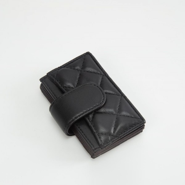 Quilted Vegan Leather Snap Card Holder

- One Outer Pocket
- Four Card Holders 
- Approximately 4" L x 3" T