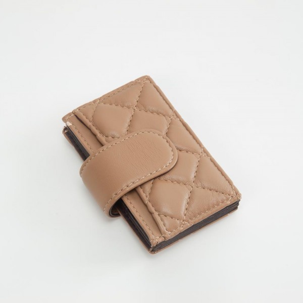 Quilted Vegan Leather Snap Card Holder

- One Outer Pocket
- Four Card Holders 
- Approximately 4" L x 3" T