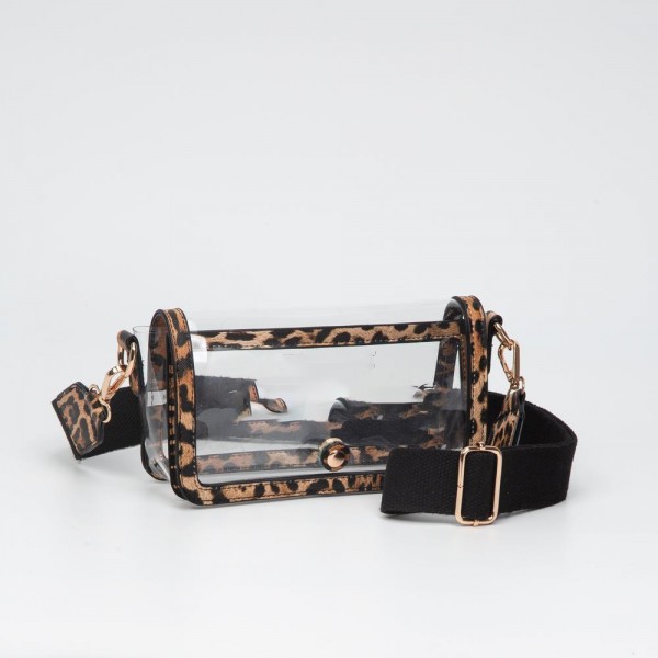 Clear Vegan Leather Crossbody Wristlet Clutch

- Magnetic Button Closure
- Removable Wristlet Strap
- Approximately 8"W X 4"T X 2.5"D
- Strap Drop 33"- 52" L 
