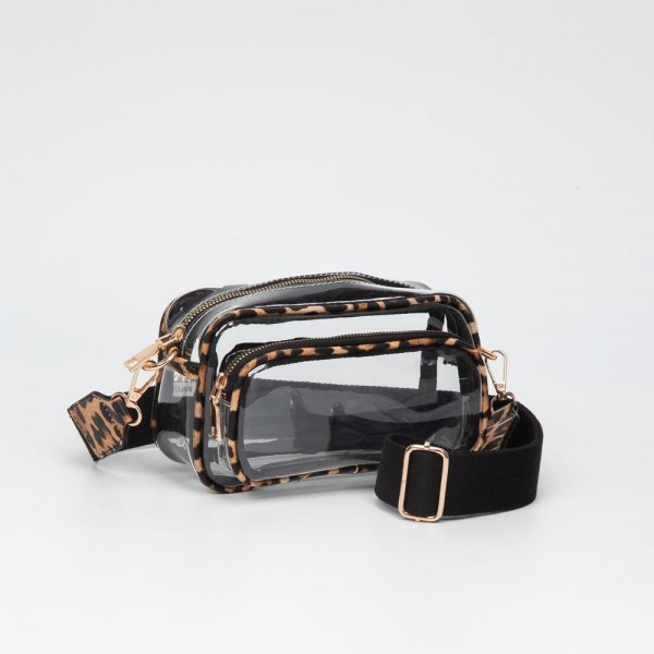 Clear Crossbody Bag With Vegan Leather Trim & Clear Outer Pockets

- Zip Closure
- Removable Vegan Leather Crossbody Strap
- Approximately 8" L X 5" T X 3" D
- Strap Drop 34" - 51" L

