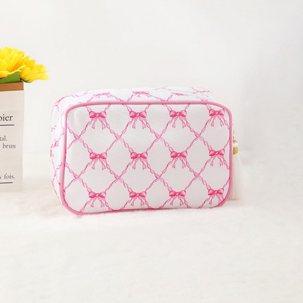 Canvas Bow Printed Pouch With Tassels 

- Full Zip Closure
- Approximately 9” L X 6” T X 2.5” D