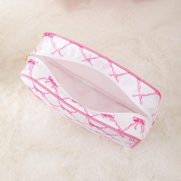 Canvas Bow Printed Pouch With Tassels 

- Full Zip Closure
- Approximately 9” L X 6” T X 2.5” D