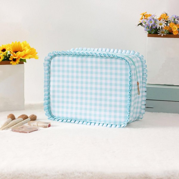 Nylon Gingham Pouch With Ruffe Edges 

- Fill Zip Closure
- Lined Body with Open Pocket
- Approximately 10.5" L X 7" T X 3.5" D
