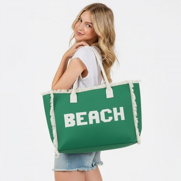 Canvas Tote Bag With "BEACH" Embroidered Canvas Patches Featuring Fringes Accents 

- Full Zipper Closure
- Lined Body with Open Pocket
- Approximately 22.5" L X 13.5" T X 5" D
- Strap Drop 8" L
- 100% Polyester