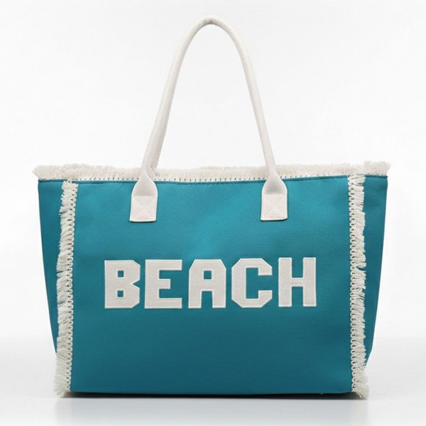 Canvas Tote Bag With "BEACH" Embroidered Canvas Patches Featuring Fringes Accents 

- Full Zipper Closure
- Lined Body with Open Pocket
- Approximately 22.5" L X 13.5" T X 5" D
- Strap Drop 8" L
- 100% Polyester