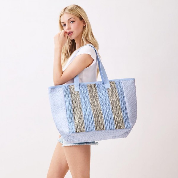 Nautical Stripe Tote Bag   

- Snap Closure
- Lined Body with Open Pocket
- Approximately 22" L X 14" T X 8" D
- 100% Polyester