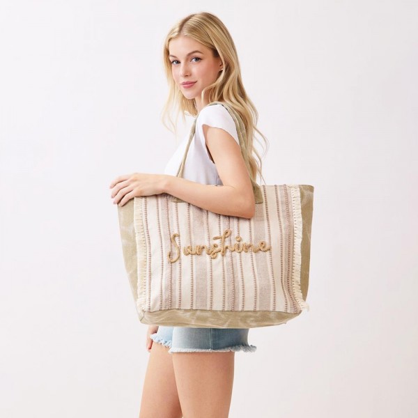 "Sunshine" Stripe Tote Bag With Fringe Detail 

- Snap Closure
- Lined Body with Open Pocket
- Approximately 21.5" L X 14" T X 6" D
- 100% Polyester