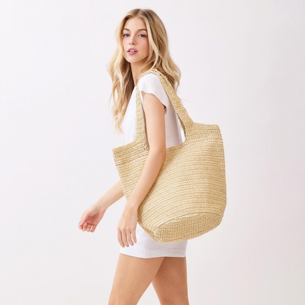 Round Bottom Woven Straw Tote Bag 

- Snap Closure
- Lined Body with Open Pocket
- Approximately 20" L X 14" T X 5.5" D
- 100% Paper
