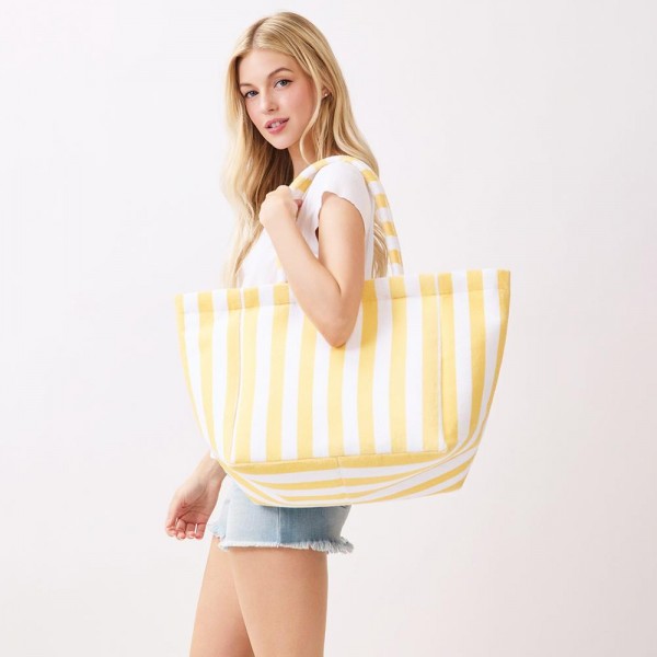 Striped Terry Cloth Tote Bag 

- Full Zip Closure
- Lined Body with Open Pocket
- Approximately 22" L X 16" T X 6" D
- 80% Polyester / 20% Polyamide 