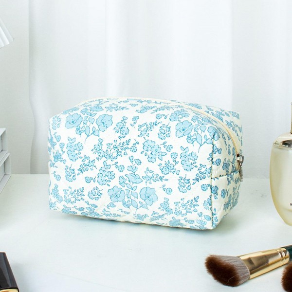Quilted Floral Print Makeup Pouch 

- Full Zipper Closure
- Lined Body
- Approximately 4.5" T X 7" L X 3" D
