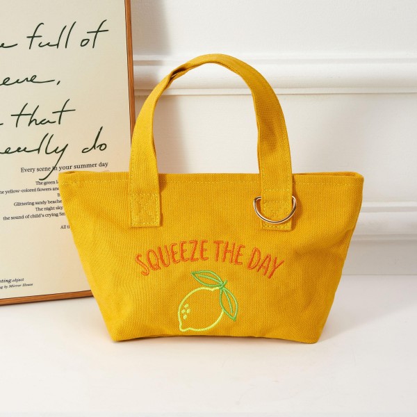 Fruit "SQUEEZE THE DAY" Embroidered Tote bag 

- Approximately 10" L X 6" T X 5" D
- 1 Open External Pocket 
- Handel Drop 4" L 
- Metal Key Ring 
- 100% Cotton 
