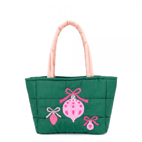 Quilted puffer bag with a padded body and embroidered hanging ornaments on the front. Sold as a padded tote and a matching zip pouch so she can carry the big one and keep the small one in it. A seasonal carry for boutique buyers stocking hostess gifts, teacher gifts, cookie exchanges, and holiday markets. Puffy quilted bags are light, wipe clean, and ring up as the easy grab and go gift all December.
