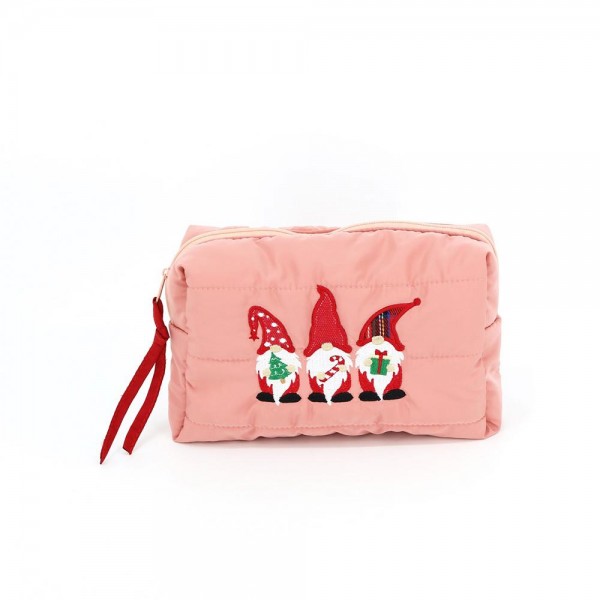 Quilted puffer bag with a padded body and an embroidered gnome trio across the front. Sold as a padded tote and a matching zip pouch so she can carry the big one and keep the small one in it. A seasonal carry for boutique buyers stocking hostess gifts, teacher gifts, cookie exchanges, and holiday markets. Puffy quilted bags are light, wipe clean, and ring up as the easy grab and go gift all December.