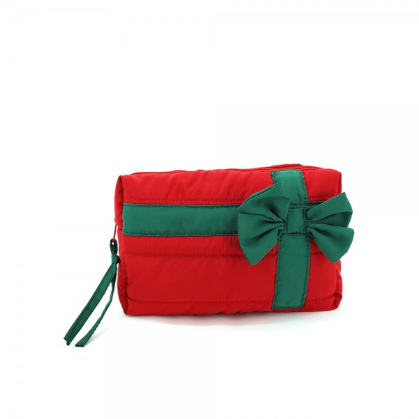 Quilted puffer bag styled like a wrapped present, with a contrast ribbon band and an oversized bow. Sold as a padded tote and a matching zip pouch so she can carry the big one and keep the small one in it. A seasonal carry for boutique buyers stocking hostess gifts, teacher gifts, cookie exchanges, and holiday markets. Puffy quilted bags are light, wipe clean, and ring up as the easy grab and go gift all December.