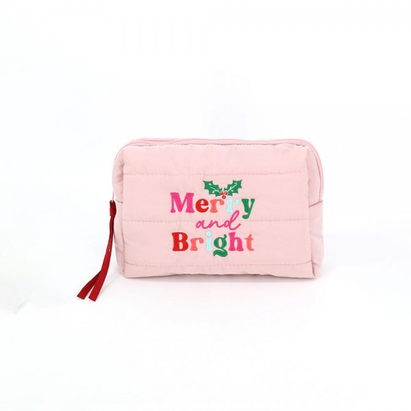 Quilted puffer bag with a padded body and an embroidered holiday greeting across the front. Sold as a padded tote and a matching zip pouch so she can carry the big one and keep the small one in it. A seasonal carry for boutique buyers stocking hostess gifts, teacher gifts, cookie exchanges, and holiday markets. Puffy quilted bags are light, wipe clean, and ring up as the easy grab and go gift all December.