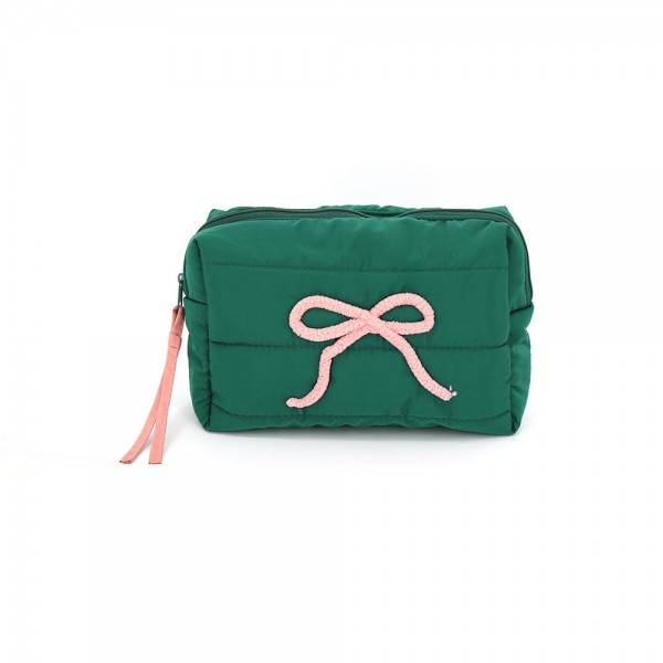 Quilted puffer bag with a padded body and an applique bow across the front. Sold as a padded tote and a matching zip pouch so she can carry the big one and keep the small one in it. A seasonal carry for boutique buyers stocking hostess gifts, teacher gifts, cookie exchanges, and holiday markets. Puffy quilted bags are light, wipe clean, and ring up as the easy grab and go gift all December.