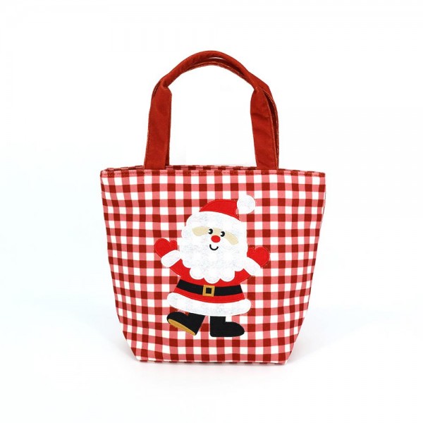 Gingham canvas tote with an embroidered santa applique and contrast webbing handles. Roomy open top carries a wrapped gift, a bottle of wine, or a stack of cookies to the party, and the flat base keeps it upright on a counter. A seasonal carry for boutique buyers stocking hostess gifts, teacher gifts, cookie exchanges, and holiday markets. Embroidered gingham totes double as the gift and the wrapping, which is why they sell out every December.