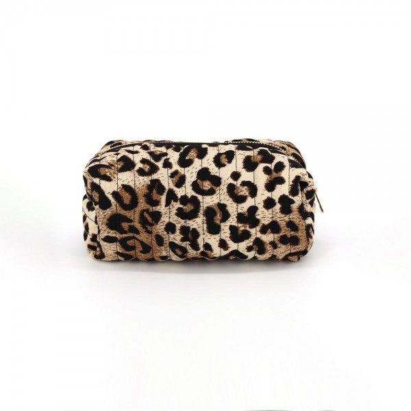 Leopard Print Cosmetic Pouch with a soft textured exterior and smooth zip-top closure. Roomy enough for makeup, brushes, and travel essentials while slipping easily into a tote or carry-on. Animal print never goes out of style — a low-price-point impulse buy that boutique customers add on without thinking twice, and a natural pairing with matching bags.