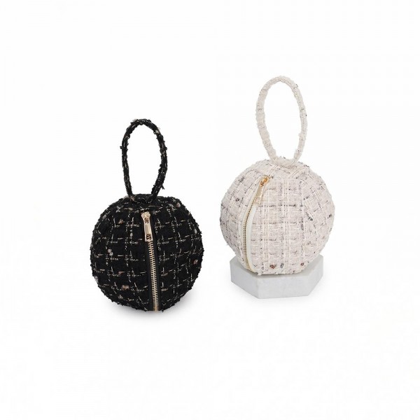Tweed ball bag with a matching round top handle and a hidden zip closure. Rounded dome shape sits upright on a shelf and holds a phone, cards, and a lipstick for a night out. A dressed up piece for boutique buyers stocking holiday parties, weddings, showers, and gallery nights. Sculptural tweed bags stop customers at the display and sell as a gift or a treat.