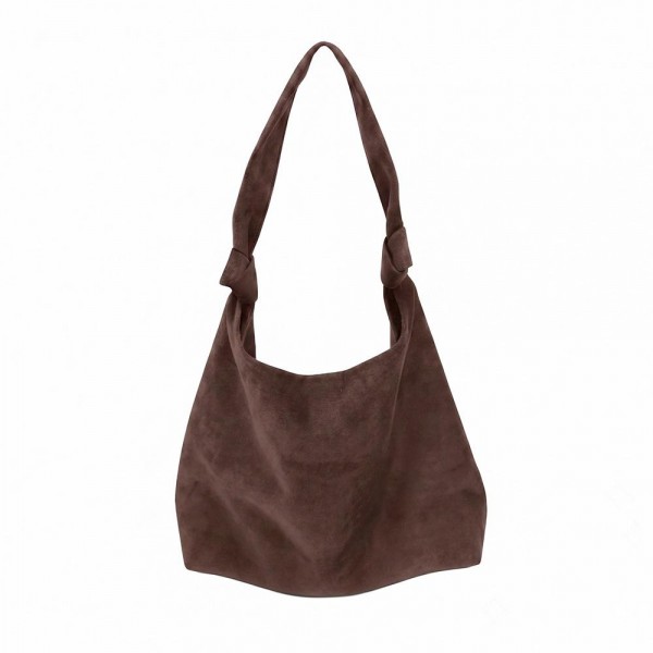 Suede shoulder bag with a soft slouch body, wide strap, and a clean minimal front. Roomy main compartment holds a wallet, phone, and sunglasses without looking bulky under the arm. An everyday carry for boutique buyers stocking travel, campus, farmers markets, and weekend errands. Soft suede shoulder bags are the shape customers come back for in every neutral.