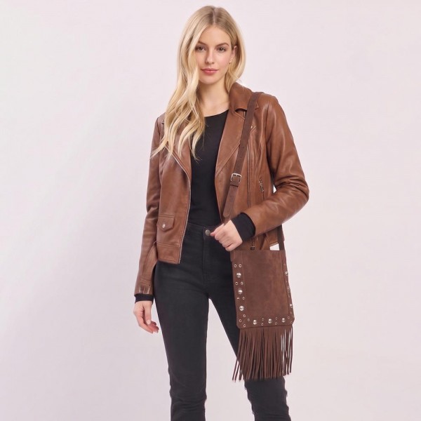 Fringe crossbody bag in a soft vegan suede with a long adjustable strap and studded trim. Slim body carries a phone, wallet, and keys, while the extra long fringe sways with every step. A western leaning piece for boutique buyers stocking concerts, rodeos, festivals, and fall travel. Fringe bags are the accessory customers photograph, and they reorder every fall.