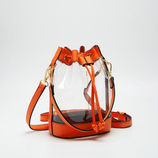 Clear Cross Body Bag With Vegan Leather Trim & Drawstring Closure 

- One Internal Card Holder 
- Detachable Cross Body Strap 
- Approximately 8" L X 8" T X 2" D