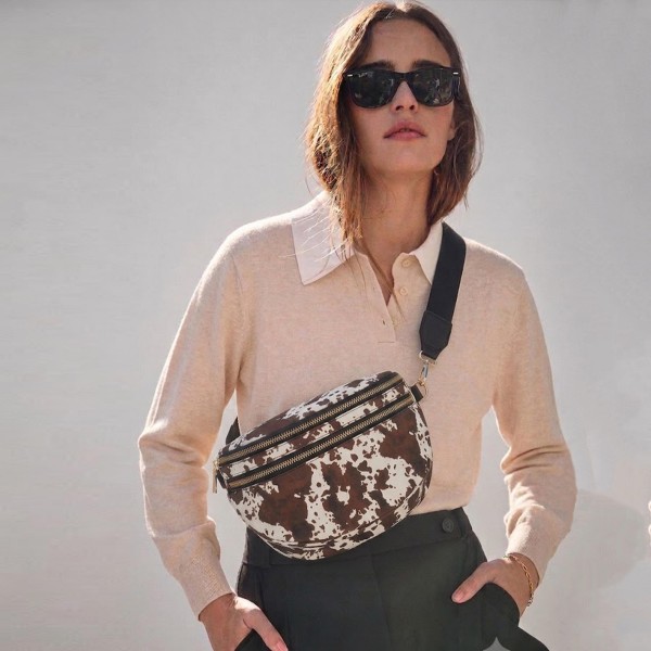Do Everything In Love Nylon Cow Print Cross Body Bag

- Full Zip Closure
- 2 Front External Zip Pockets
- 1 Back External Zip Pocket  
- Lined Body
- 1 Internal Zip Pocket
- Removable Cross Body Strap
- 100% Polyester
- Approximately 12" L X 9" T X 4" D