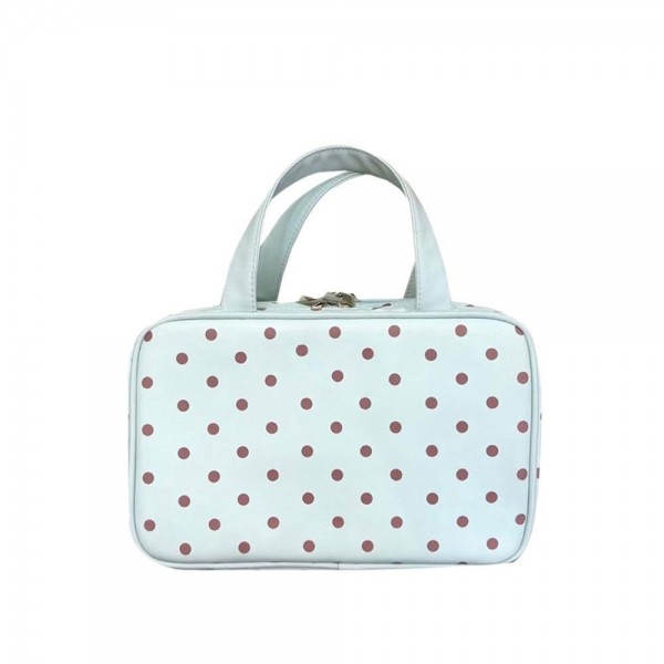 Handled travel cosmetic bag with a double zip closure and a rectangular profile that packs flat along the side of a suitcase. Short top handles make it easy to lift out of a bag, and the coated polka dot shell cleans up with a quick wipe. It holds a full routine plus a hairbrush without bulging at the seams. A dependable gift item and a natural companion to the matching tote.