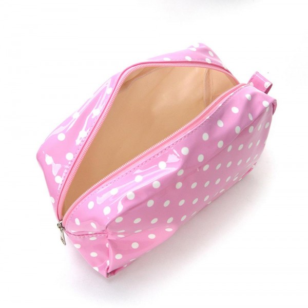 Coated polka dot cosmetic pouch with a wide zip top opening and a side pull tab that makes it easy to grab out of a bag. The flat base lets it sit open on a counter so nothing has to be dumped out to find a lipstick. Wipeable inside and out, which keeps it looking new after a season of daily use. A true impulse price accessory that customers buy two or three at a time.