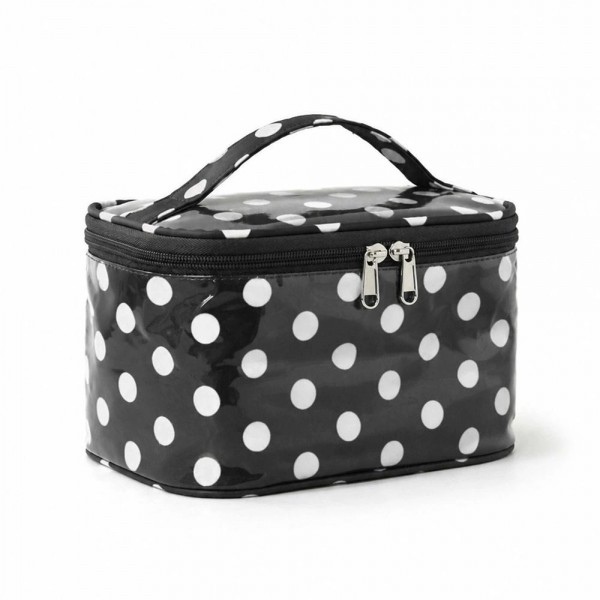Polka dot train case with a zip around lid, a top carry handle, and a roomy single compartment that stands up on its own. The coated exterior wipes clean in seconds and the flat base keeps it steady on a bathroom counter or a hotel vanity. It holds a full daily routine plus brushes without squashing anything. A tidy gift item that sells on looks alone and pairs naturally with a matching tote.