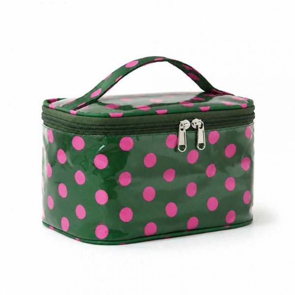 Polka dot train case with a zip around lid, a top carry handle, and a roomy single compartment that stands up on its own. The coated exterior wipes clean in seconds and the flat base keeps it steady on a bathroom counter or a hotel vanity. It holds a full daily routine plus brushes without squashing anything. A tidy gift item that sells on looks alone and pairs naturally with a matching tote.
