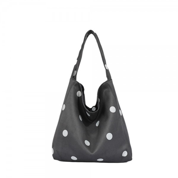 Polka Dot Hobo Tote with a soft slouchy silhouette, a single shoulder strap, and a spacious interior for wallets, water bottles, and everyday extras. The scattered dot print adds a playful touch to simple outfits, from jeans and sweaters to casual dresses. Lightweight and easy to carry from workday to weekend. Slouchy hobo shapes are back in demand, and this one delivers an on trend look at a price that makes it an easy add for any boutique bag display.