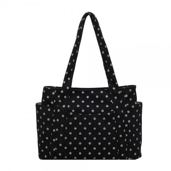 Quilted polka dot tote bag with a roomy main compartment, twin shoulder straps, and open side pockets sized for a phone or a water bottle. The lightweight body holds its shape when packed and folds down flat for storage between trips. A practical everyday carry that covers work, the gym, and weekend errands without looking like a gym bag. Printed totes at this price point move well as an add on beside the register.