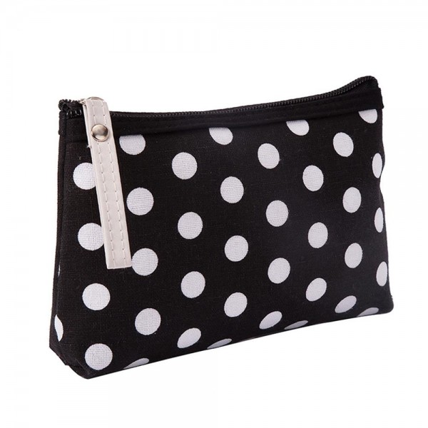 Polka Dot Zip Cosmetic Pouch in a coated canvas with a classic dot print, contrast zipper trim, and an easy grab pull tab. The slim, flat bottom shape slips into any purse or carry on and holds makeup, pens, earbuds, and other small essentials. The wipe clean finish keeps it looking fresh trip after trip. A sweet everyday organizer and an easy gift with purchase or stocking stuffer for boutique shoppers.