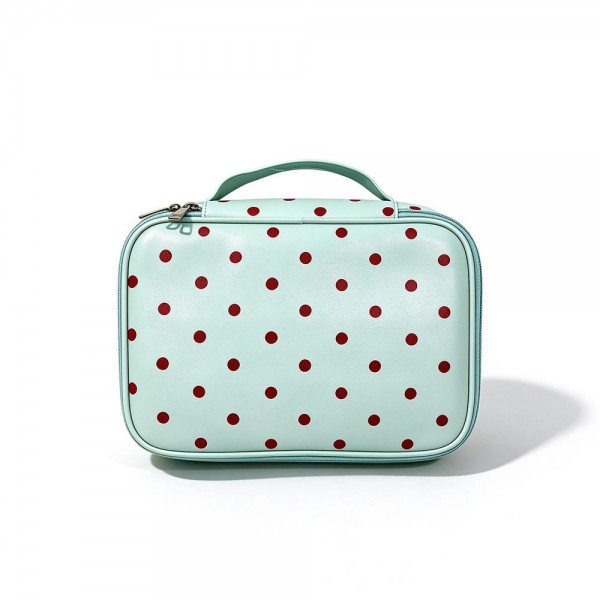 Polka Dot Makeup Case in smooth faux leather with a zip around closure, a structured boxy shape, and a sturdy top carry handle. The roomy interior holds brushes, skincare, and full size products, making it perfect for travel, the gym bag, or organizing a vanity. The wipeable finish makes quick work of everyday spills. A sweet, giftable organizer that pairs beautifully with matching polka dot pouches for an easy cross sell.