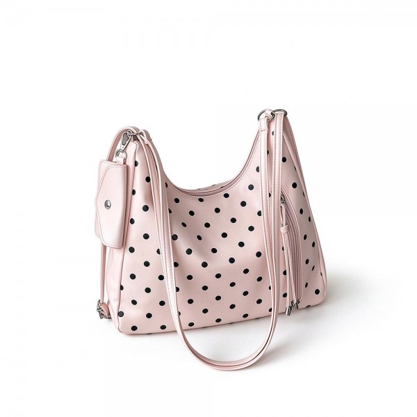 Polka Dot Convertible Hobo Backpack in soft faux leather with a slouchy silhouette, sturdy top handle, and adjustable straps that switch it to a hands free backpack in seconds. A side zip pocket with a tassel pull and a matching mini card pouch keep keys, cards, and lip balm within easy reach. Carry it to work, class, or on a weekend getaway. A versatile two in one bag that gives shoppers more style for their money and sells through quickly.