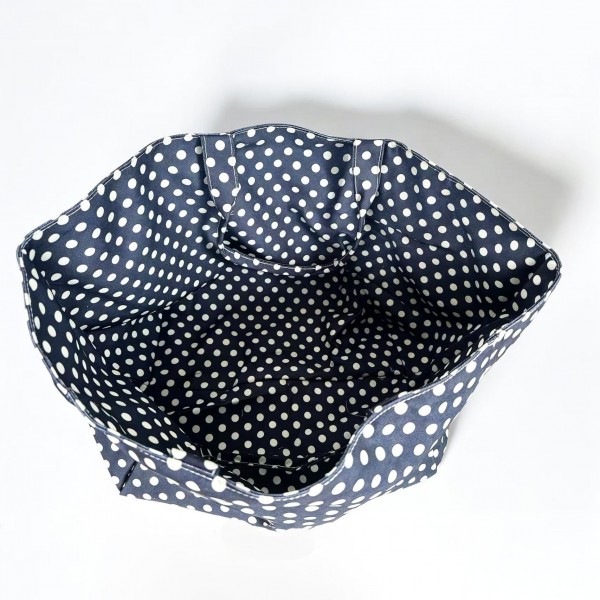Polka Dot Tote Bag in a durable woven fabric with an allover classic dot print, matching shoulder straps, and a roomy open top that fits a laptop, water bottle, and everyday essentials. The wide, structured base keeps everything organized on the go. Perfect for beach days, farmers markets, school runs, and weekend getaways. A cheerful, budget friendly carryall that sells fast on its own and makes an easy gift.