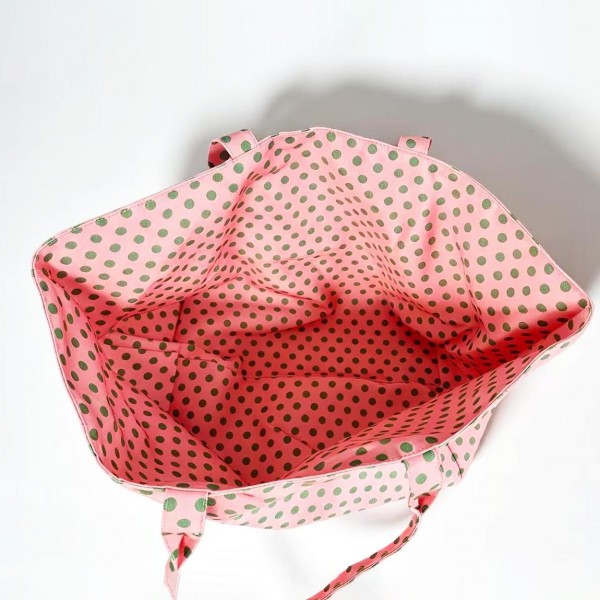 Polka Dot Tote Bag in a durable woven fabric with an allover classic dot print, matching shoulder straps, and a roomy open top that fits a laptop, water bottle, and everyday essentials. The wide, structured base keeps everything organized on the go. Perfect for beach days, farmers markets, school runs, and weekend getaways. A cheerful, budget friendly carryall that sells fast on its own and makes an easy gift.