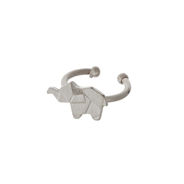 Silver tone adjustable ring displaying an elephant. 