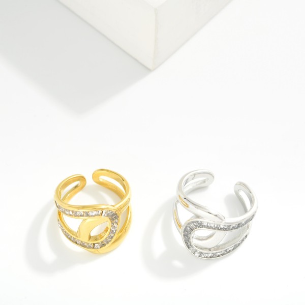 Overlapping Metal Tone & Baguette Rhinestone Ring 

- Water Resistant 
- Stainless Steel
- Size 7