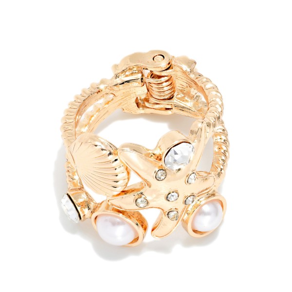 Layered Twisted Metal Hinged Ring With Shell & Starfish Details 

- Size 7