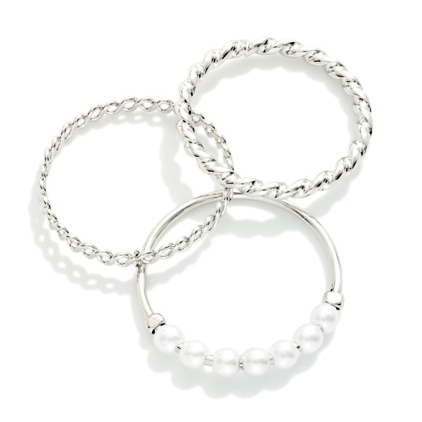 Set Of Three Stackable Rings Featuring Metal Tones & Pearls 

- Size 7-8.5 