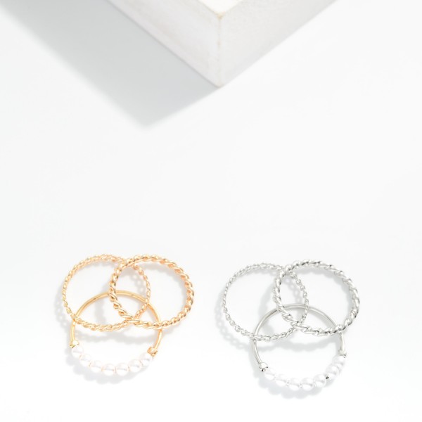 Set Of Three Stackable Rings Featuring Metal Tones & Pearls 

- Size 7-8.5 