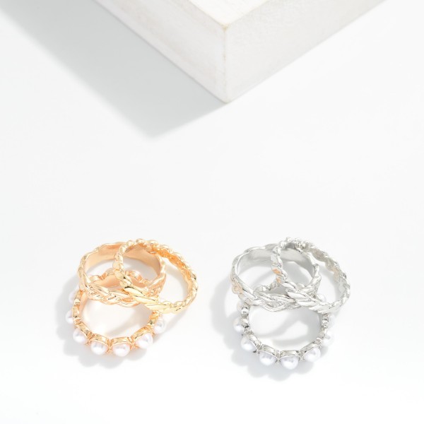 Set Of Three Stackable Rings Featuring Metal Tones & Pearls 

- Size 6.5 - 7.5
